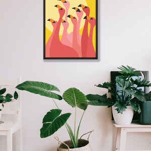 May include: A digital illustration of a group of pink flamingos with black beaks against a yellow background with a large yellow circle.