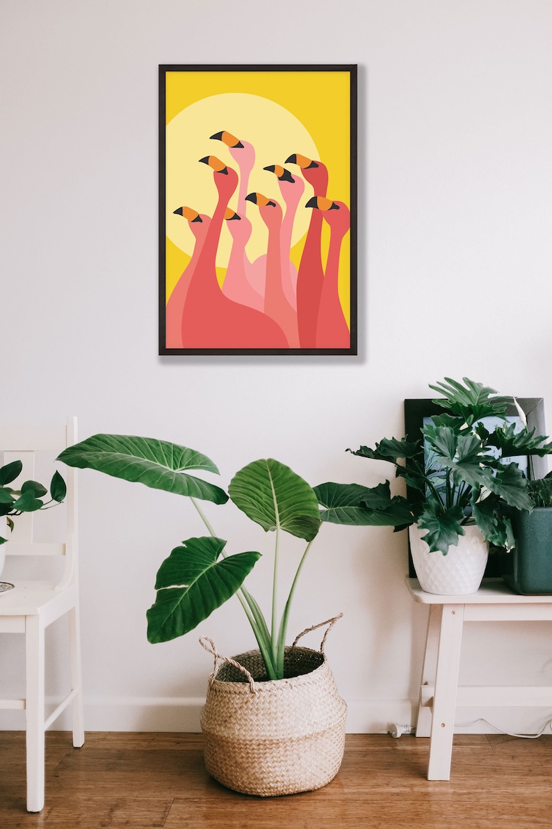 May include: A digital illustration of a group of pink flamingos with black beaks against a yellow background with a large yellow circle.