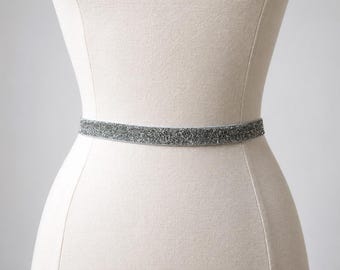 glitter belts for dresses Pangda 2 Pcs Women Stretchy Rhinestone Dress O Ring Buckle Bling Diamond Belts Women Shiny Party at Amazon Women's Clothing store offering a comfortable Silver Glitter Elastic Belt -