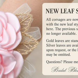 May include: A pink satin flower corsage with a central pearl and rhinestone accent, paired with gold embroidered mesh leaves. Text reads: NEW LEAF STYLE. All corsages are now made with the new leaf style shown here. Gold leaves are standard.