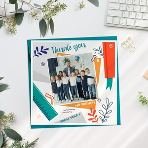 May include: A thank you card with a photo of a teacher and students in a classroom. The card has a teal, orange, and gray geometric design with the text "Thank you", "Mr. French", and "From Year 4".