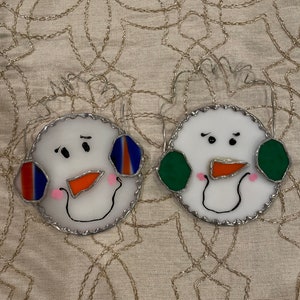Pair of ear muffed snowmen.
