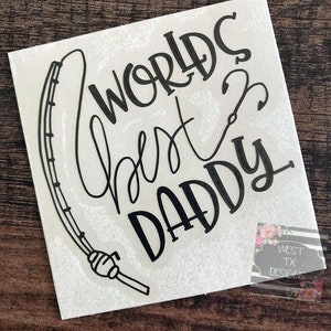 May include: Black and white vinyl decal with a fishing rod and the text "Worlds Best Daddy".