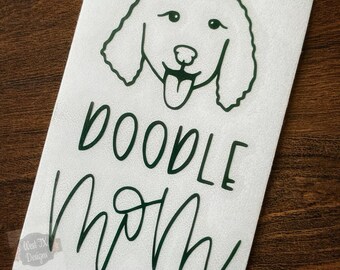May include: Green vinyl decal with a doodle dog illustration and the text "Doodle Mom".