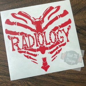 May include: A red Radiology sticker featuring a heart-shaped design made of rib bones. The word "RADIOLOGY" is written in stylized letters within the rib cage. The sticker is on a white background.