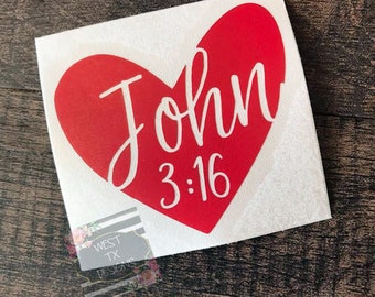 May include: Red heart-shaped vinyl decal with the name "John" and the Bible verse "3:16" in white lettering.
