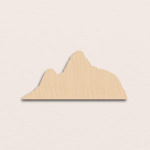 May include: A wooden cutout in the shape of the state of Virginia. The cutout is a light tan colour, with visible wood grain. The design features the outline of the state's mountainous western region.