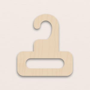 May include: A light-coloured wooden clothes hanger with a curved hook and a rectangular base with a rounded opening. The hanger is made of light-coloured wood and has a smooth finish. The design is simple and minimalist.