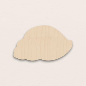 May include: A wooden seashell cutout, in a light tan hue with a smooth, unpainted finish. The seashell shape has a rounded top and a scalloped edge along the bottom, ideal for craft projects or decorative use.