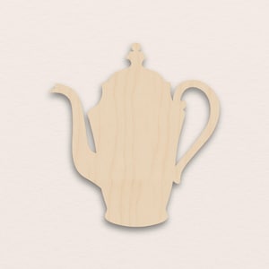 May include: A light brown wooden teapot cutout, featuring a curved spout and handle. The teapot has a decorative top. Ideal for craft projects or home decoration, this cutout is a charming addition.