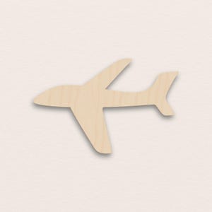 May include: A wooden airplane cutout with a natural wood grain finish. The airplane features a classic design with wings, a tail, and a fuselage. The cutout is ideal for crafts, decorations, or educational purposes.
