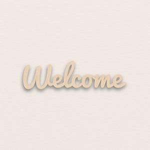 May include: A wooden sign in a cursive font that reads "Welcome". The sign is a light beige colour and has a slight shadow, giving it a 3D effect. The background is a solid, light beige colour.