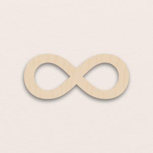 Peut inclure: Un symbole infini en bois, un chiffre huit couché, est présenté sur un fond neutre. Le symbole est brun clair avec une finition lisse et projette une ombre subtile, lui donnant une apparence en trois dimensions. Cet article convient aux travaux manuels et à la décoration intérieure.