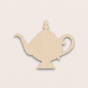 May include: A light brown wooden teapot cutout, featuring a curved spout and handle. The teapot has a decorative finial on the lid. Ideal for craft projects and DIY enthusiasts.