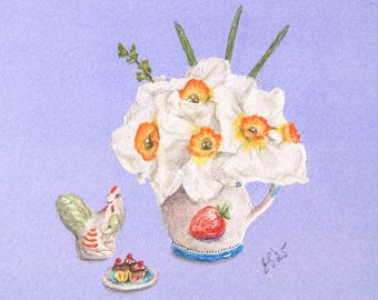 May include: A white ceramic pitcher with a strawberry design is filled with a bouquet of white daffodils with orange centers. A small ceramic rooster figurine and a plate of chocolate-covered strawberries are on a light purple background.