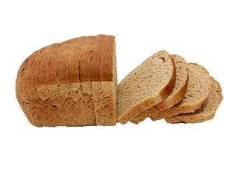 May include: A loaf of sliced brown bread. The bread is partially sliced and the slices are stacked on top of each other.