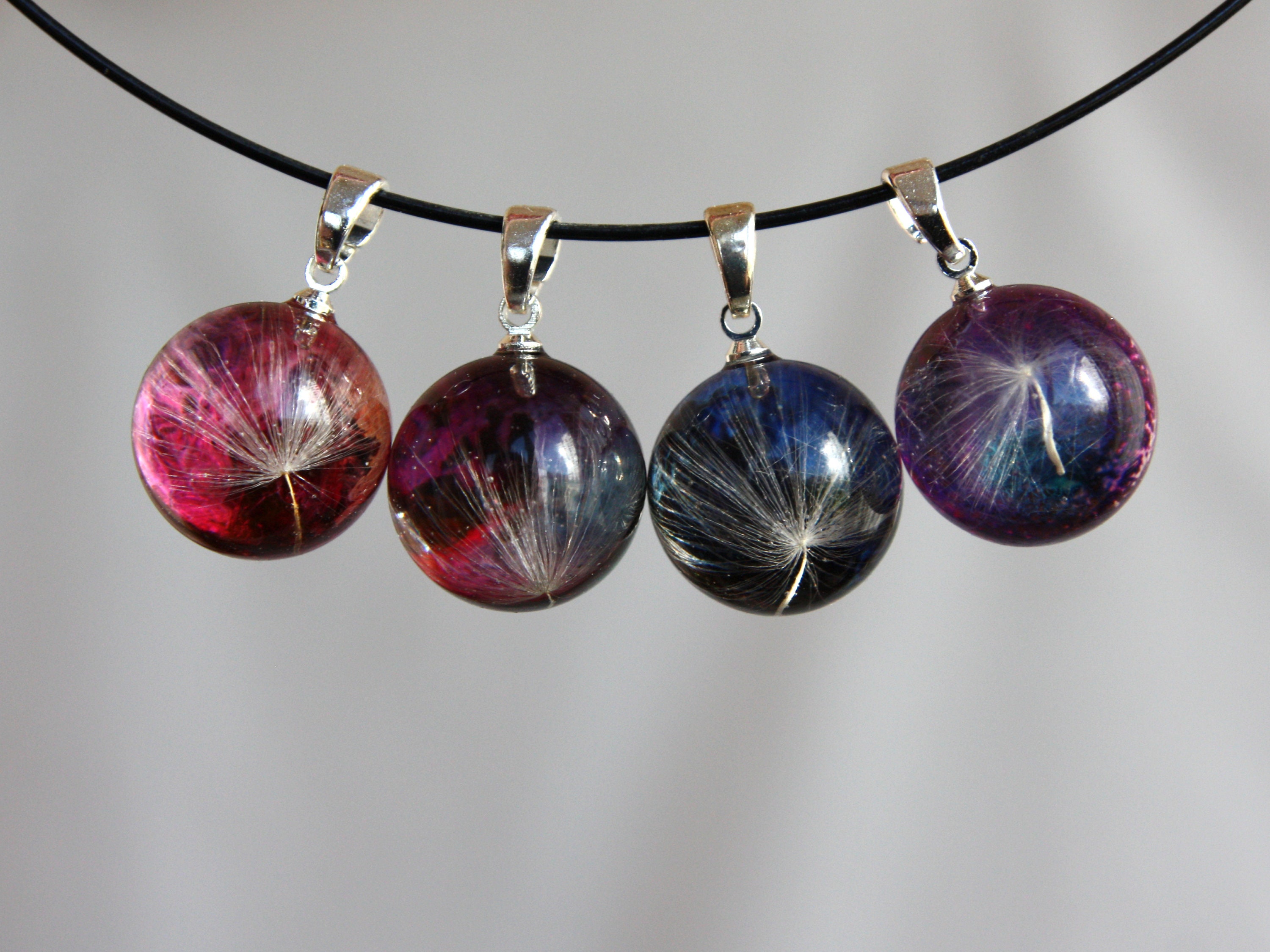 Pendant sphere from dandelion fluff against the background of bizarre patterns, Petri art pendant, Real dandelion in epoxy resin