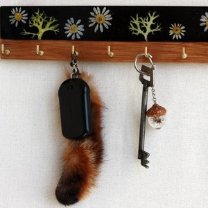 Key holder made of burnt meranti wood, chamomile flowers, evernia oakmoss and epoxy resin, Key organizer