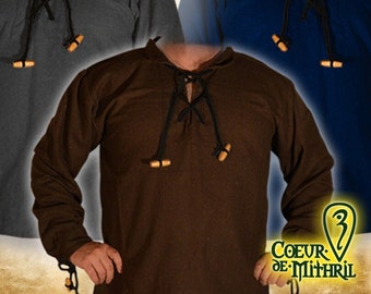 May include: Three long-sleeved shirts with a lace-up neckline and wooden toggles. The shirts are in brown, grey, and blue.