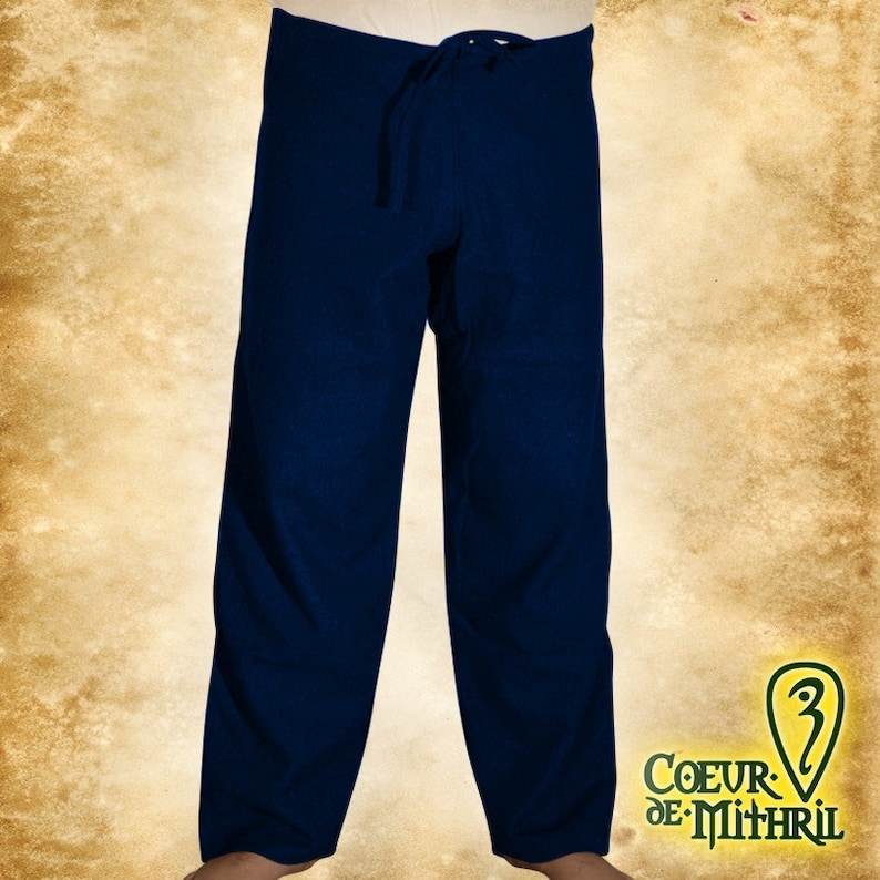 May include: Dark blue pants with a drawstring waist. The pants are made of a soft, comfortable fabric and have a relaxed fit.