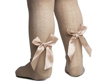Biscuit coloured Jacquard tights with bow detail