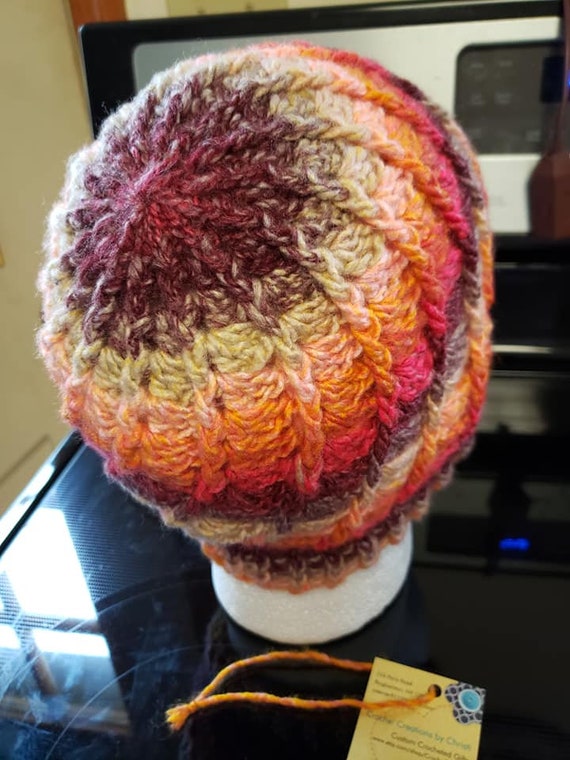 Hand made crocheted beanie NWOT. Multi colored ( red, orange, white) stretchy!! Red Orange Purple Crochet Beanie, Women main image 4