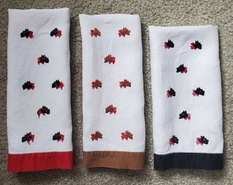 Three vintage Linen Tea Towels Embroidered with Scotty Dogs Red, Black, and Brown Trim