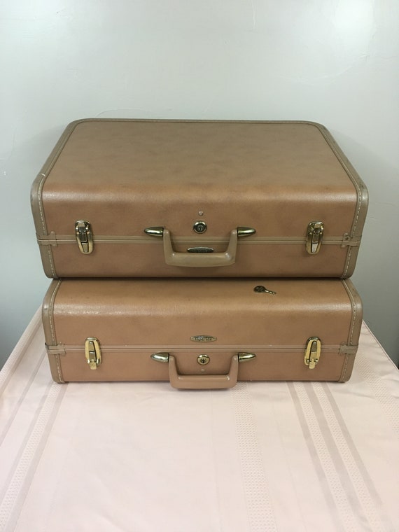 taperlite vintage luggage