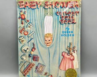 May include: Vintage "Baby Shower Cutout Doll Book" by Queen Holden. The cover features illustrations of baby items, a baby's face, and a pink dress. Includes 7 baby dolls.