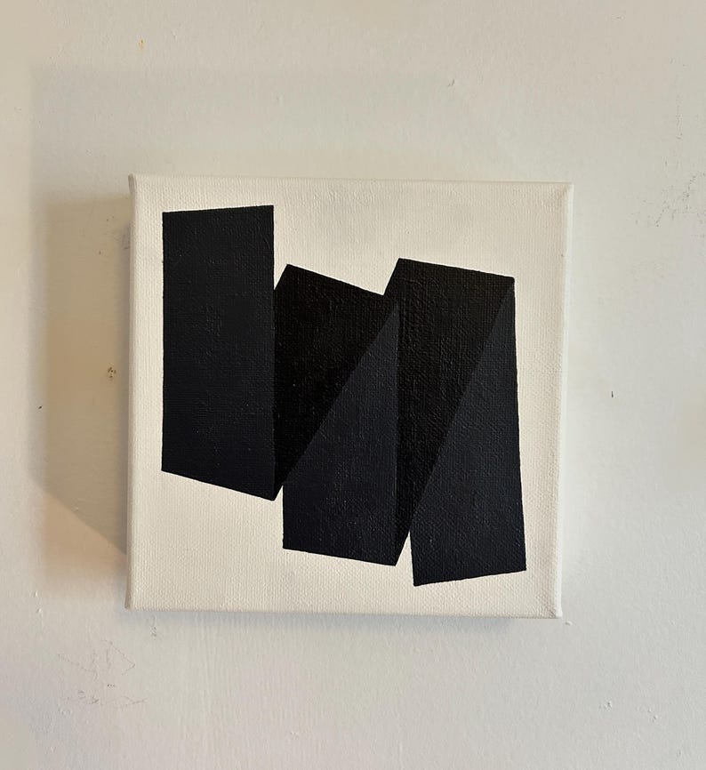 May include: Abstract painting on canvas with black geometric shapes on a white background.