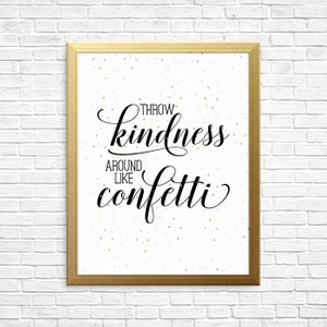 Könnte beinhalten: Ein gerahmter Druck mit weißem Hintergrund und goldenem Konfetti. Der Druck zeigt schwarzen Text mit der Aufschrift "Throw kindness around like confetti."