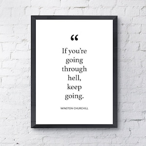 May include: Black and white motivational quote print with the text "If you're going through hell, keep going." and the author "Winston Churchill" below the quote.