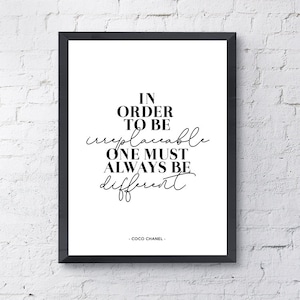 May include: Black and white typography print with the quote "In order to be irreplaceable one must always be different."  The quote is attributed to Coco Chanel.