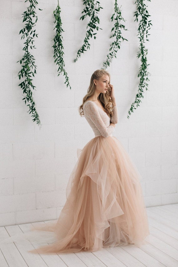 long sleeve blush wedding dress