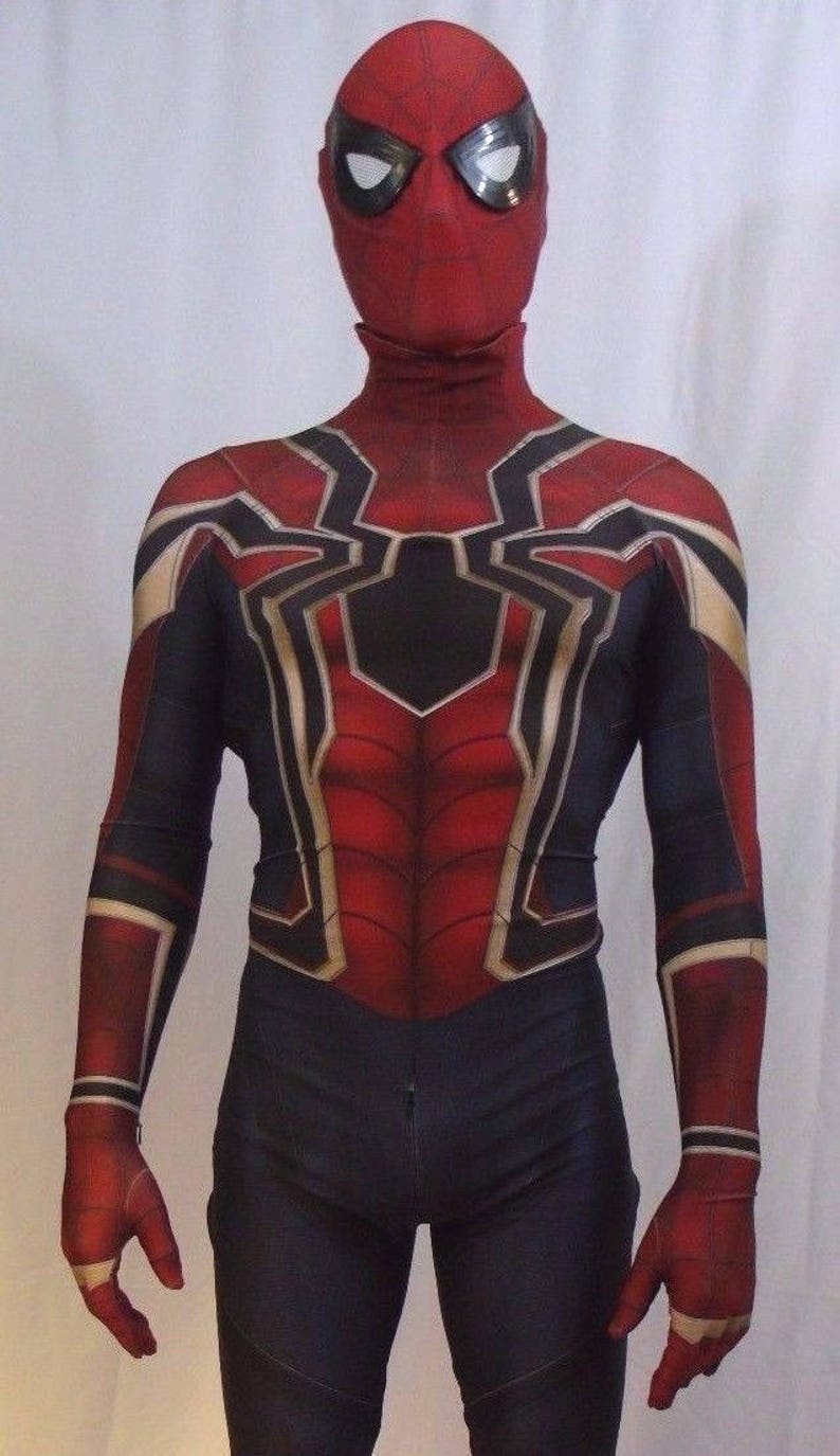 May include: A red and black spandex costume with a spider design. The costume has a red mask with a white spider design. The costume is a full-body suit with long sleeves and trousers.