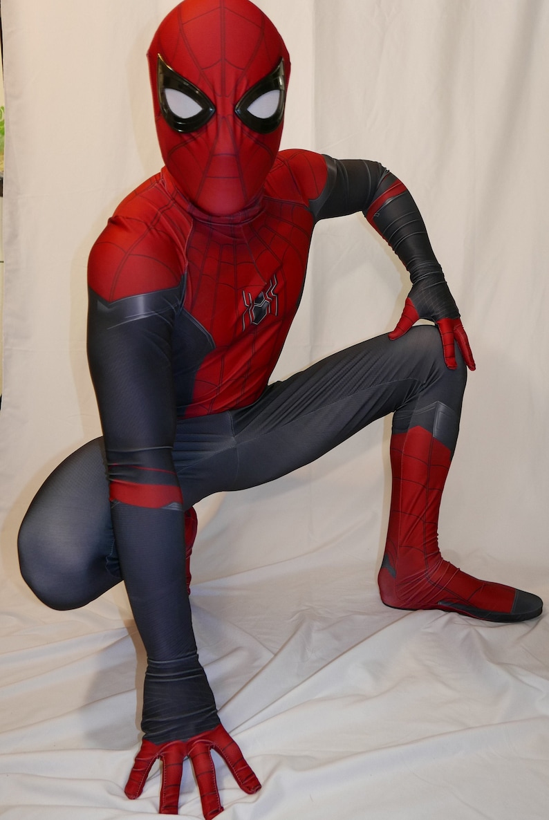 May include: A red and black Spiderman costume with a black mask and a spider logo on the chest. The costume is made of a stretchy material and has a sleek design.