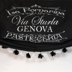 May include: Black and white valance with a white fringe trim. The valance has a black chalkboard-style fabric with the text "La Fornarina Via Sturla GENOVA PASTICCERIA" in white lettering.