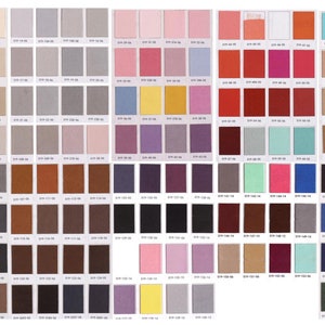May include: A color chart with 100 different fabric swatches. The swatches are arranged in rows and columns, and each swatch has a number printed on it. The colors range from light to dark, and include shades of beige, gray, brown, pink, yellow, red, blue, and green.