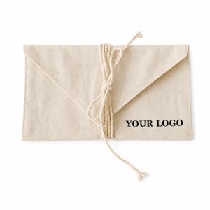 May include: A rectangular off-white canvas envelope pouch with a triangular flap, secured by a tied natural fibre string. The front of the pouch features the black printed text YOUR LOGO positioned on the lower right side of the envelope.