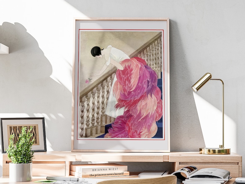 a painting of a woman in a pink dress on a wall