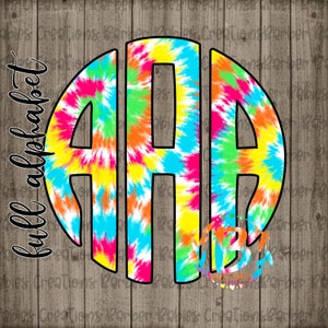 May include: A tie-dye monogram design featuring the letters AAA in a vibrant mix of pink, yellow, green, orange, and blue. The letters are set within a black outlined circle, with the words "full alphabet" in a script font.