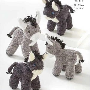 May include: Four grey knitted donkey toys, each with a white muzzle and blue eyes. The donkeys are different sizes, ranging from 28 to 35 cm in length. The pattern is called "double knit" and the pattern number is 9159.