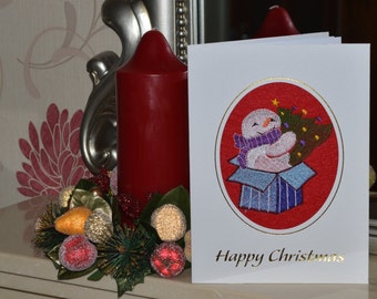 Machine embroidered  hand finished christmas card - Snowman in present box .