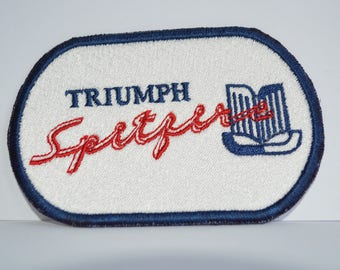 Ein neues maschinengesticktes von Hand gefertigtes Stoffabzeichen - Triumph Spitfire.