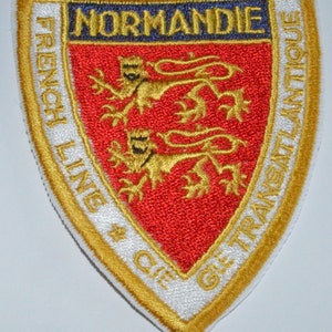 A new machine embroidered hand finished cloth badge – SS Normandie - French Line . ( B75 ).