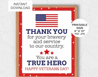 May include: A framed printable sign with a patriotic theme. The sign features the American flag, the text "THANK YOU" and "TRUE HERO", and the message "HAPPY VETERANS DAY!" The sign is 8" x 10" and available as a PDF and JPG.