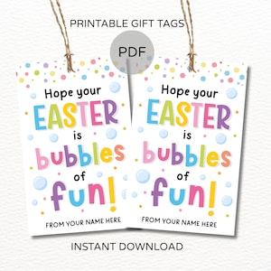 May include: Two white printable Easter gift tags with colorful text and a string for hanging. The tags read "Hope your Easter is bubbles of fun!" with space to add a name. The tags are decorated with colorful dots and bubbles.