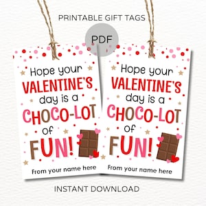 May include: Two printable Valentine's Day gift tags with the text "Hope your Valentine's day is a Choco-Lot of Fun!" in red and pink. Each tag features a chocolate bar graphic and is designed for instant download.
