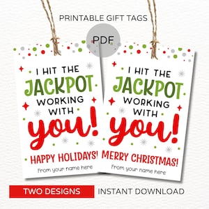May include: Printable gift tags with the text "I hit the jackpot working with you!" in green and red. The tags have a festive design with red and green accents, and the words "Happy Holidays!" and "Merry Christmas!" are also included.