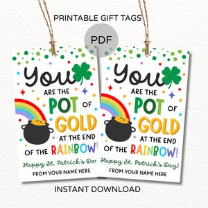 May include: Two printable St. Patrick's Day gift tags with the text "You are the pot of gold at the end of the rainbow!" and a rainbow graphic. The tags have a shamrock and a pot of gold.